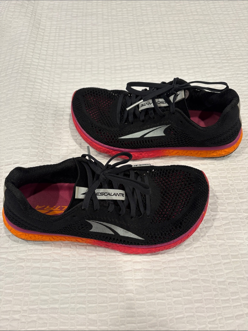 Alta Escalante Women's Black Running Shoes with Pink & Orange Sole
Size 7.5